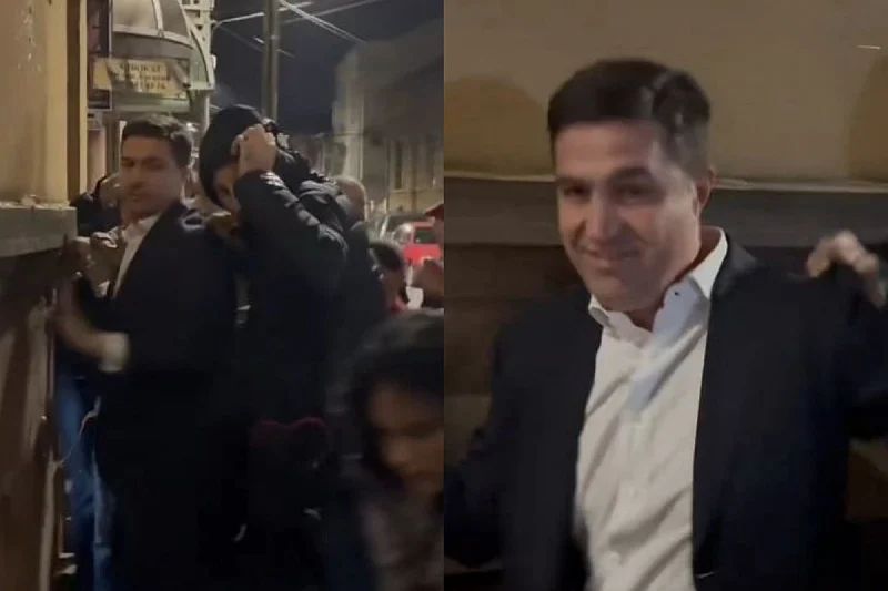 Na snimku se vidi da je Pavlović uspio da izbjegne jaja, ali ne i vodu kojom je ispolivan          