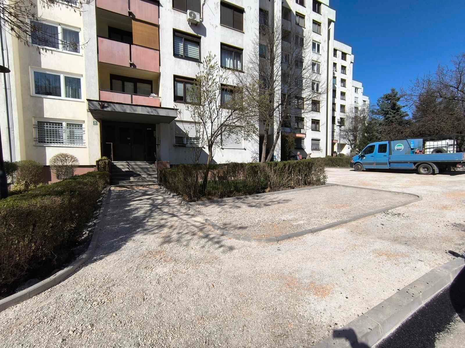 Asfaltiranje pješačkih staza, prilaza stambenim zgradama i požarnih puteva u Olimpijskoj ulici